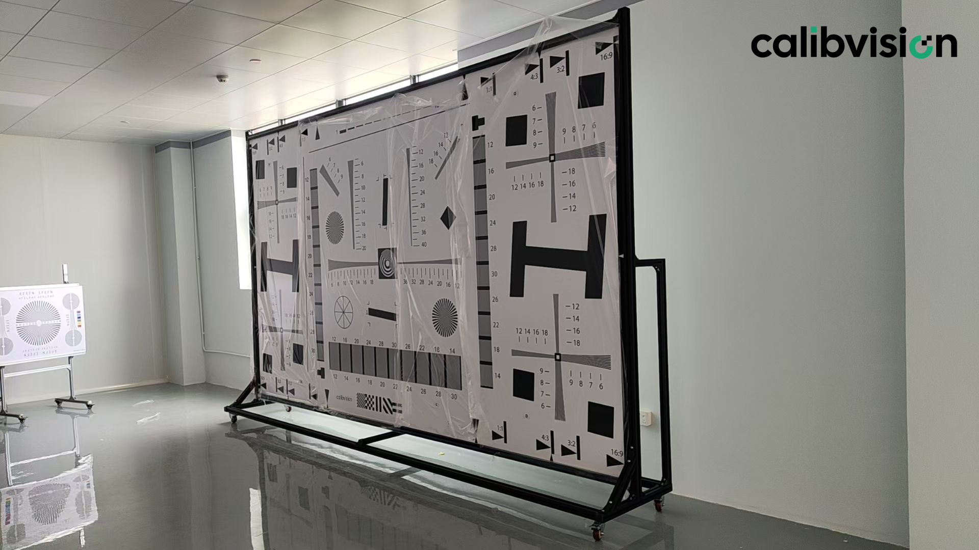 calibvision large format iso 12233 test chart on a production grade test stand